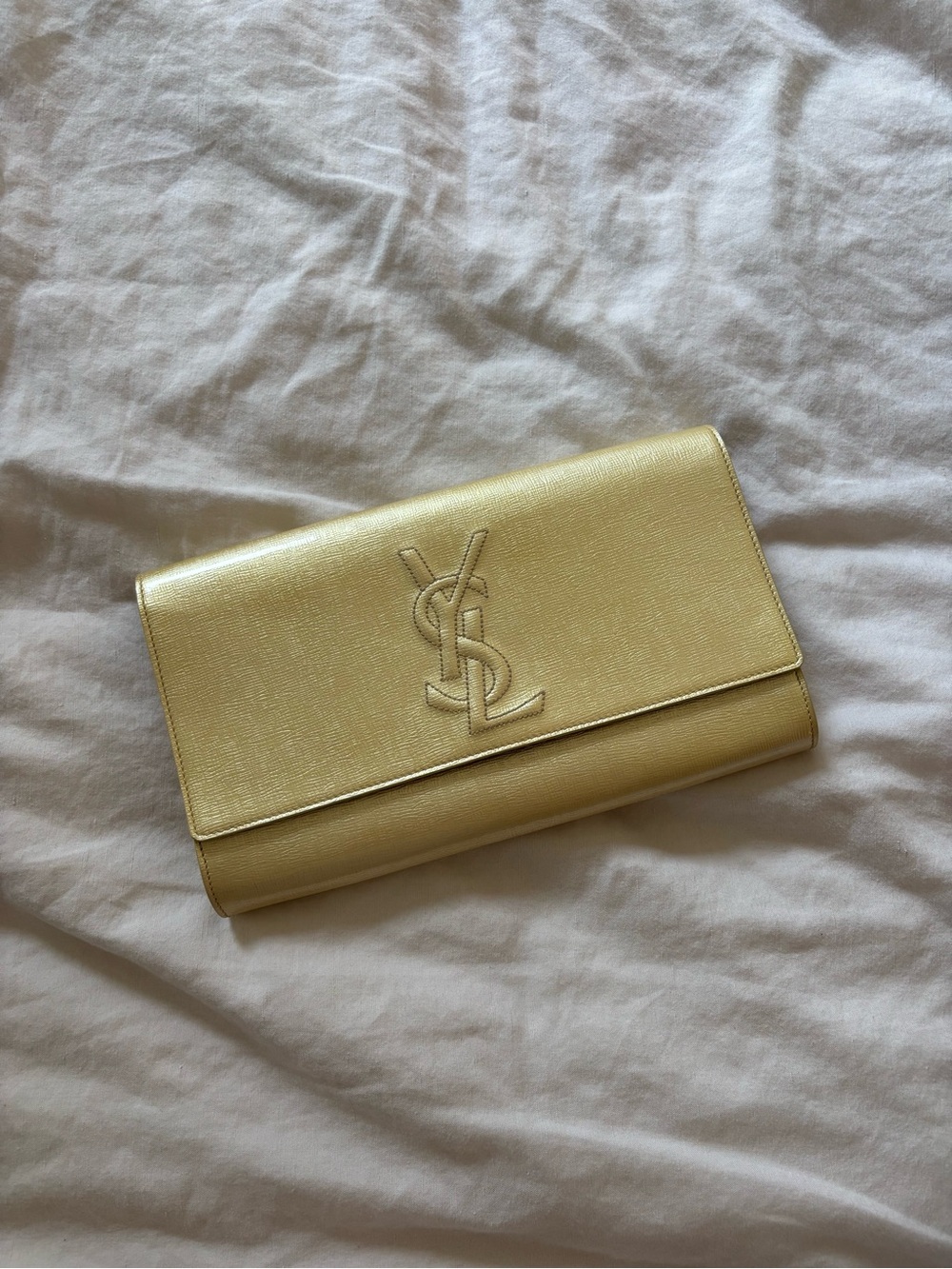 Vintage Yves Saint Laurent Belle de Jour clutch in metallic gold leather
